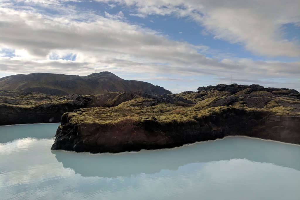 a curving landscape topped with moss from the retreat in iceland