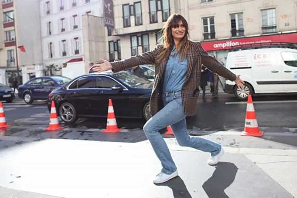 caroline de maigret posing on the sidewalk