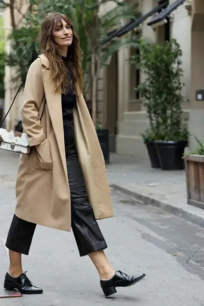 caroline de maigret in a long coat