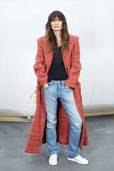 caroline de maigret in a long coat