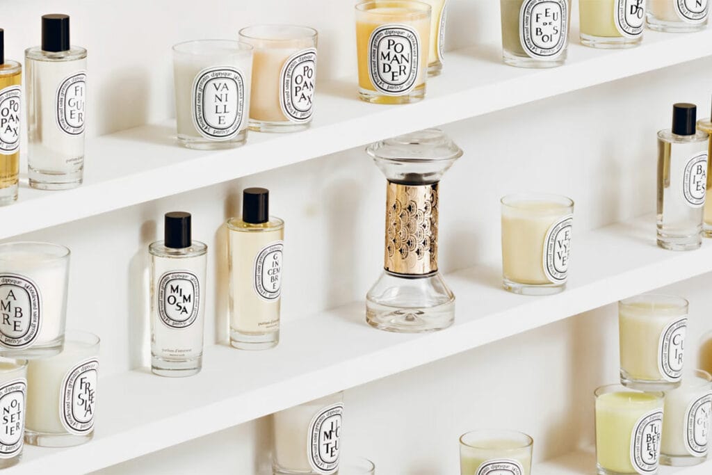 image of diptyque candles arranged on a shelf