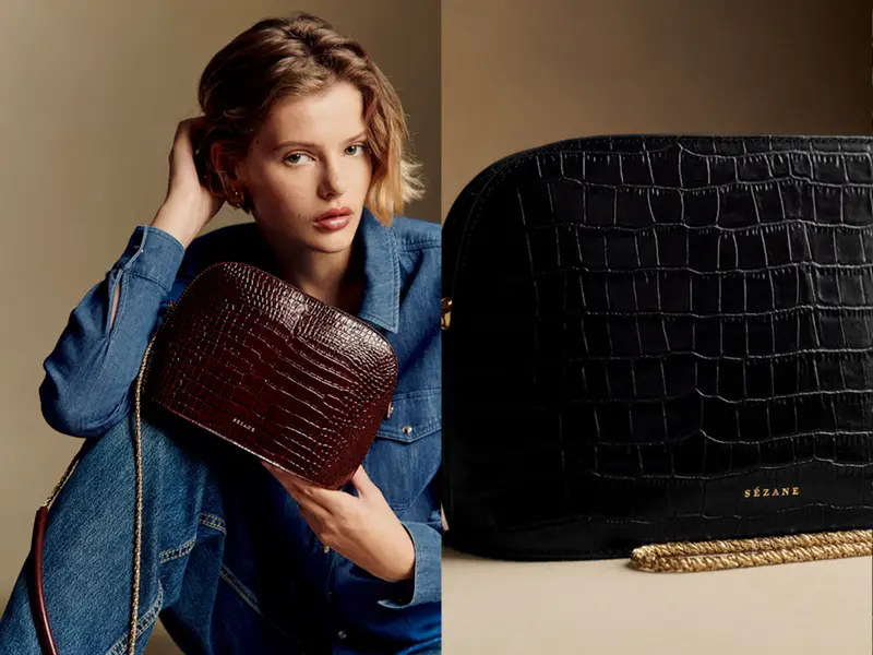victor bag sezane shown in chocolate crocodile and black crocodile texture