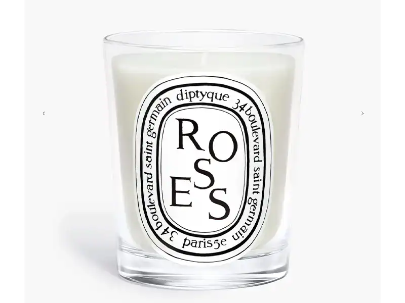 diptyque roses in glass vessel