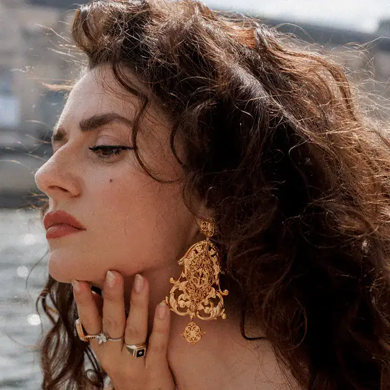 jennifer behr golden filigree aimee earrings shown on model