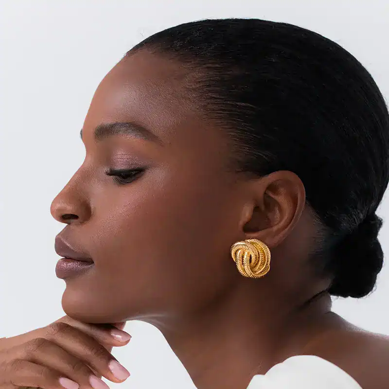 jennifer behr golden elaina earrings shown on model