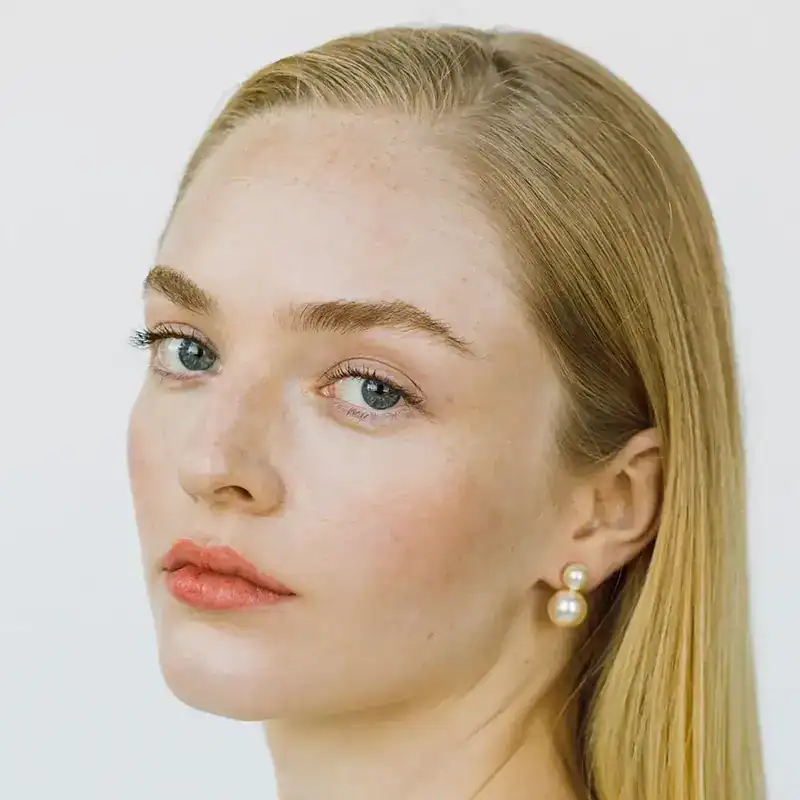 jennifer behr pearl iris earrings shown on model