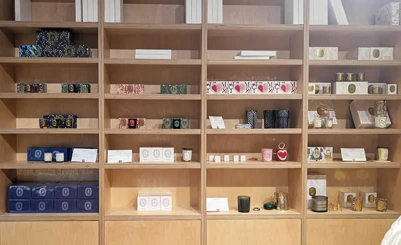 the shelves at diptyque at vallee village outlet mall